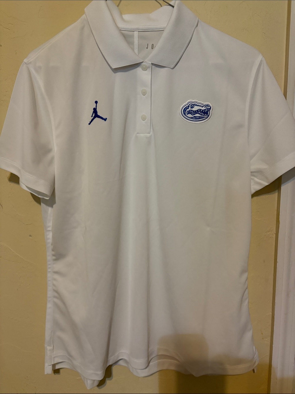 Jordan White Polo with Blue Jumpman and Gators logo